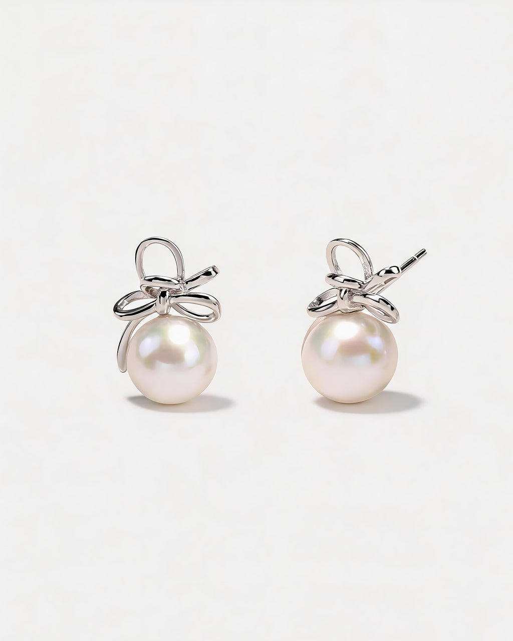 Gisèle Silver Bow Natural Pearl Stud Earrings